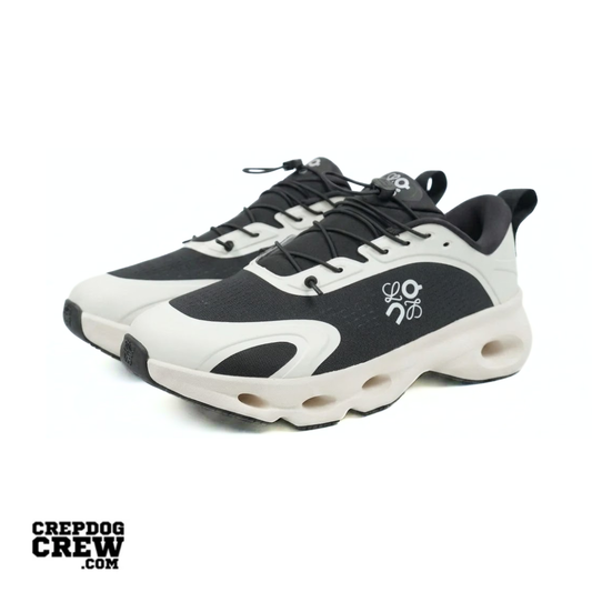 ON Running Cloudsolo Loewe Black Eggshell