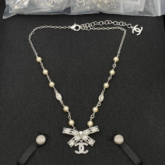 18K Chanel Bow Tie Diamond Gold Necklace