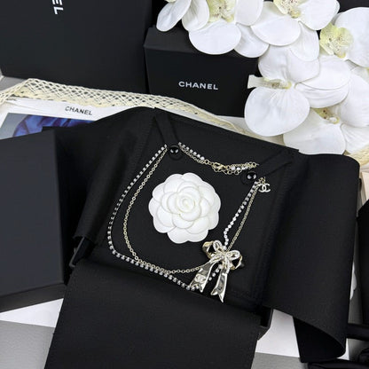 18K  Chanel 25K Bow Tie Diamond Gold Necklace
