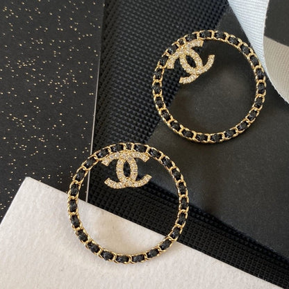 18K  Chanel Black Leather Circle Earrings